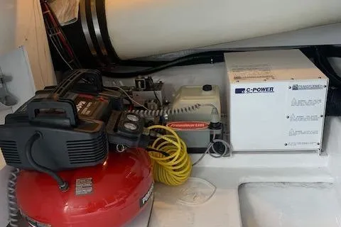 Slide: The Image of Engine room of 2002 Viking 55 Convertible with equipment and machinery. - 41