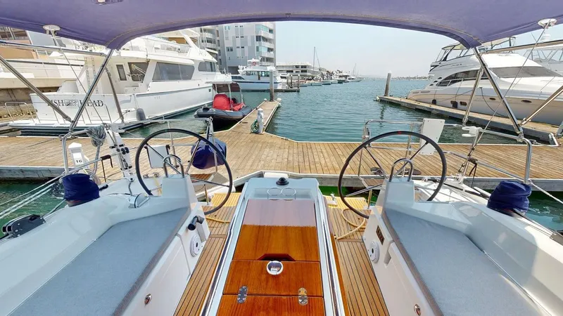 The Image of Cockpit view of 2021 Beneteau Oceanis 40.1 yacht docked at marina. - 1