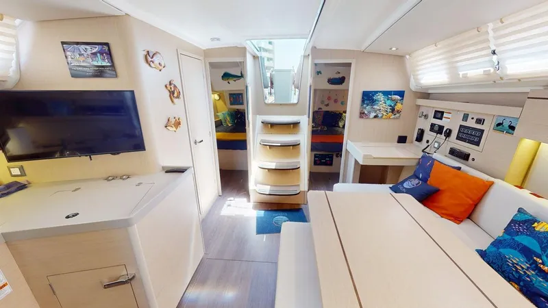 Slide: The Image of Interior of 2021 Beneteau Oceanis 40.1 yacht, featuring modern decor and comfortable seating. - 11