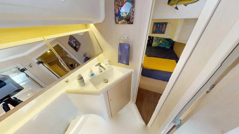 Slide: The Image of Interior of 2021 Beneteau Oceanis 40.1 yacht bathroom and cabin area. - 16