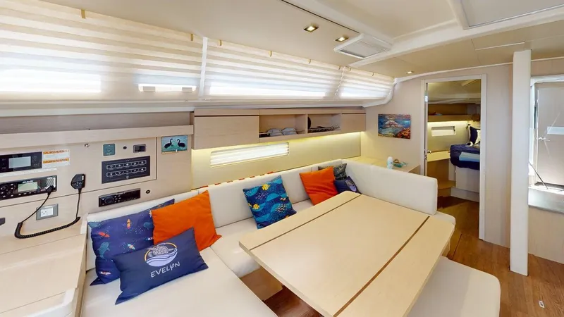 Slide: The Image of Luxurious interior of 2021 Beneteau Oceanis 40.1 yacht with cozy seating and modern decor. - 25