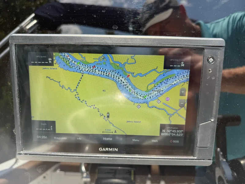 Slide: The Image of Garmin GPS display on 2021 Sea Hunt Ultra 219 boat, showing a detailed waterway map. - 8