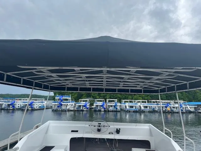 Slide: The Image of Houseboat marina view under canopy, Lakeview model, 1992, overcast sky. - 18