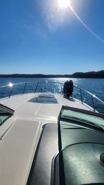 Slide: The Image of Sea Ray 310 Sundancer 2010 cruising on a sunny day with clear blue skies. - 3