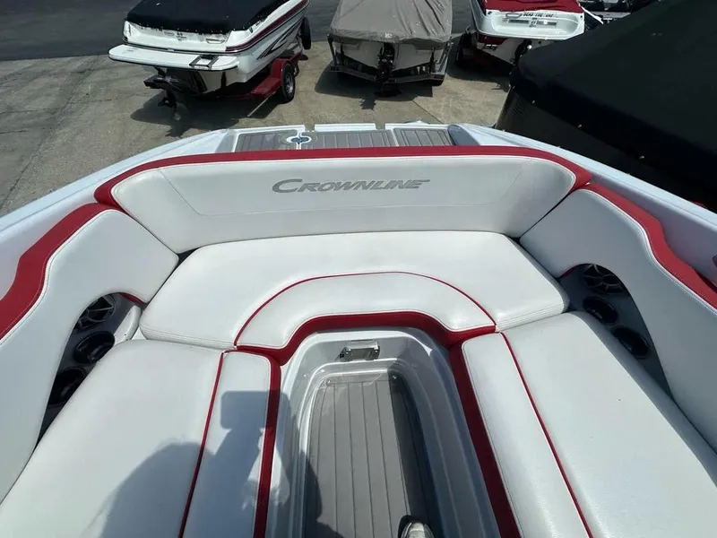 Slide: The Image of 2017 Crownline E2 boat interior with white and red seating. - 5