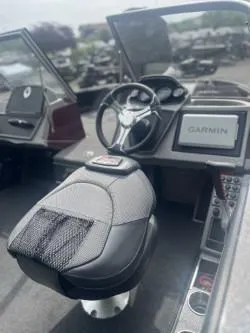 Slide: The Image of 2023 Ranger 1880MS boat interior with Garmin navigation system and steering wheel. - 3