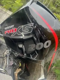 Slide: The Image of 2023 Ranger 1880MS with Mercury Pro XS 200 outboard motor, black and red design. - 4