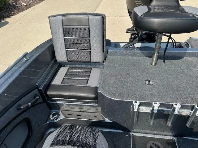 Slide: The Image of 2025 Ranger 1880MS boat interior with seating and storage compartments. - 14