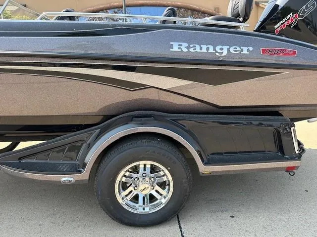 Slide: The Image of 2025 Ranger 1880MS boat with sleek design and shiny chrome wheel. - 3