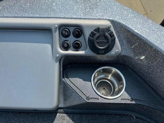 Slide: The Image of Control panel of 2025 Ranger 1880MS boat with cup holder and switches. - 5