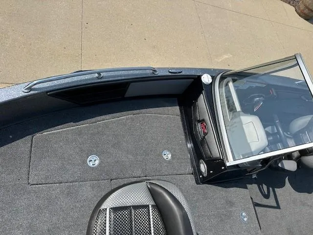 Slide: The Image of 2025 Ranger 1880MS boat interior with seating and windshield, showcasing modern design and functionality. - 6