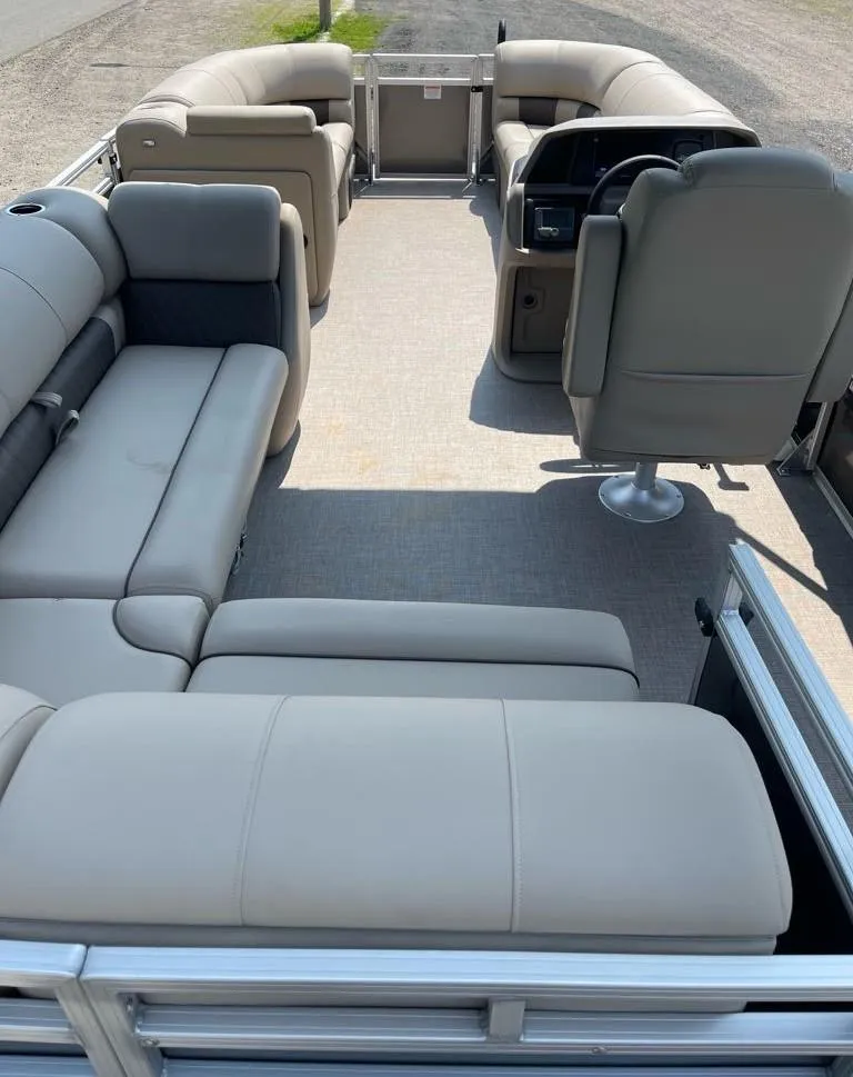 Slide: The Image of 2025 Sun Tracker Party Barge 20 DLX interior with spacious seating and modern design. - 7