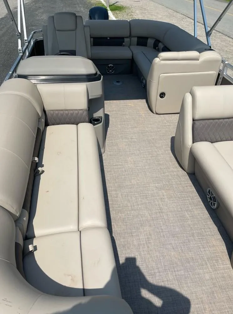 Slide: The Image of 2025 Sun Tracker Party Barge 20 DLX interior with spacious seating and modern design. - 8