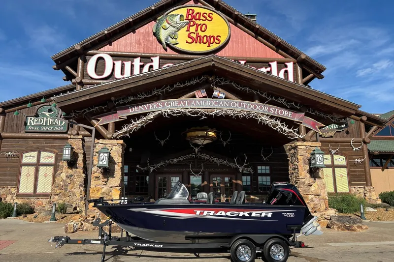 The Image of 2025 Tracker Targa V-18 WT boat displayed outside Bass Pro Shops in Denver. - 0