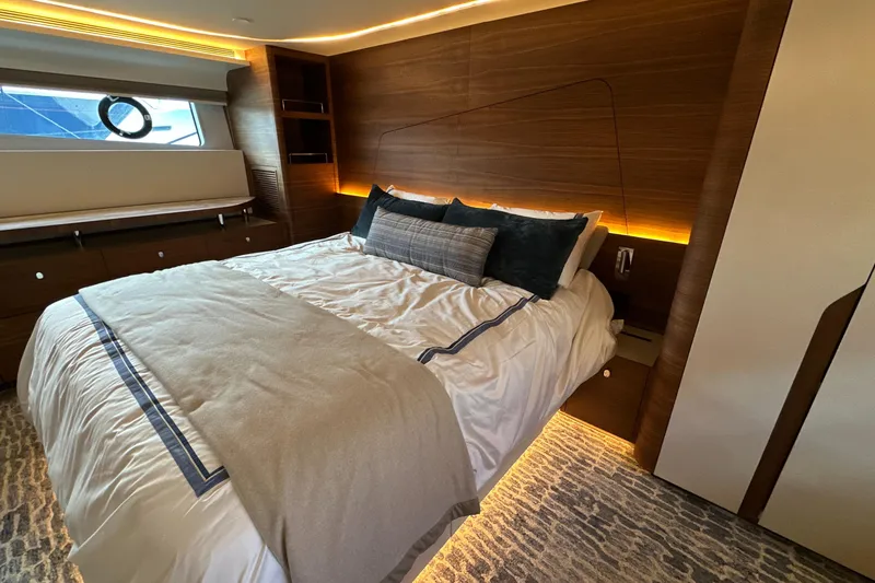 Slide: The Image of Luxurious bedroom interior of 2023 CL Yachts CLB65 with modern design and ambient lighting. - 34