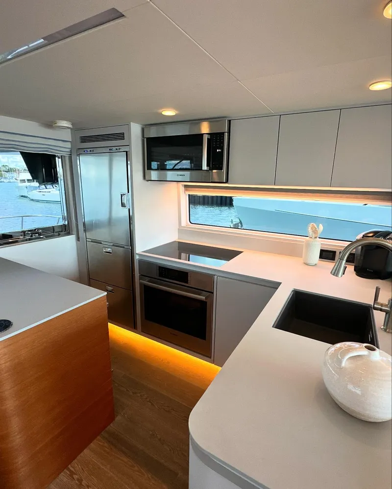 Slide: The Image of Modern kitchen interior of 2023 CL Yachts CLB65 with sleek appliances and elegant design. - 22