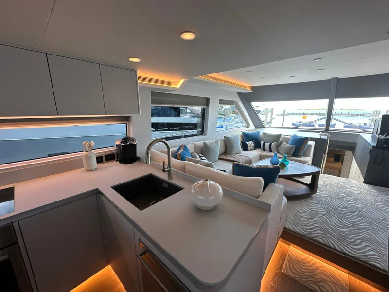 Slide: The Image of Luxurious interior of 2023 CL Yachts CLB65 with modern kitchen and cozy seating area. - 24