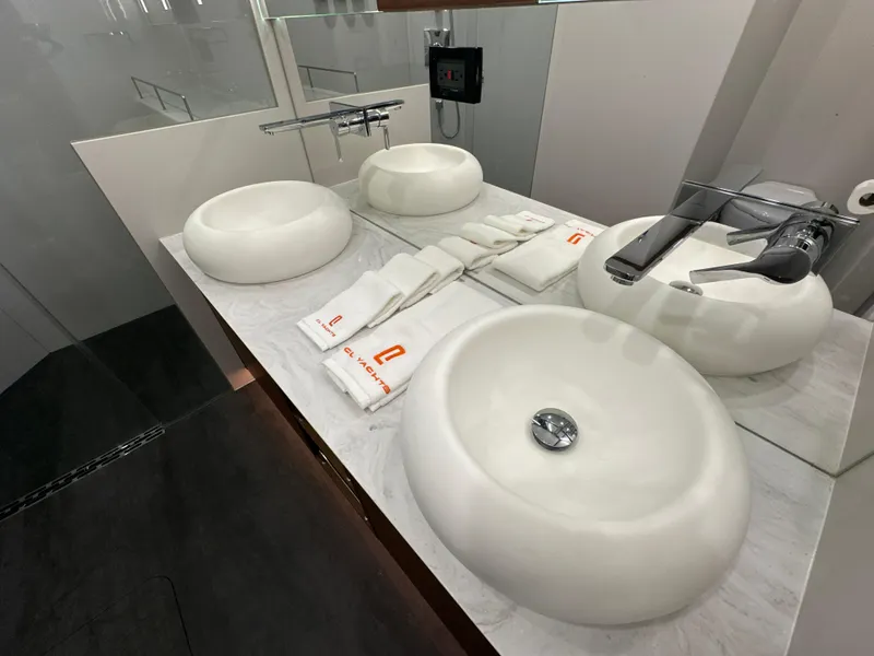 Slide: The Image of Luxurious bathroom in 2023 CL Yachts CLB65 with modern sinks and elegant fixtures. - 43