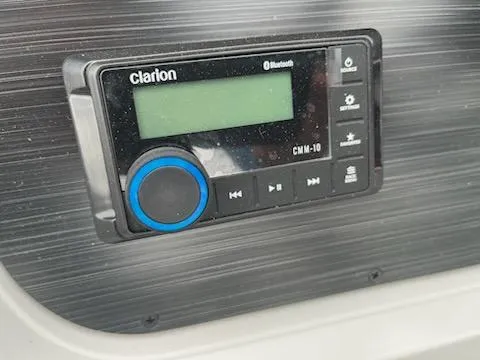 Slide: The Image of Clarion Bluetooth audio system in 2025 Godfrey SWEETWATER 2286SFL boat. - 14