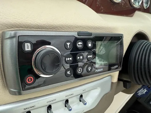 Slide: The Image of Control panel of a 2012 Regal 24 FasDeck boat with Fusion audio system. - 15