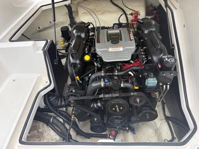 Slide: The Image of 2012 Regal 24 FasDeck engine compartment showcasing detailed mechanical components. - 29