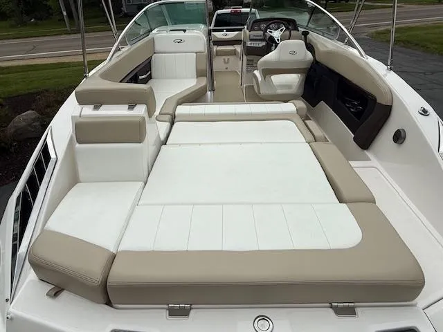 Slide: The Image of 2012 Regal 24 FasDeck boat interior with spacious seating and modern design. - 7
