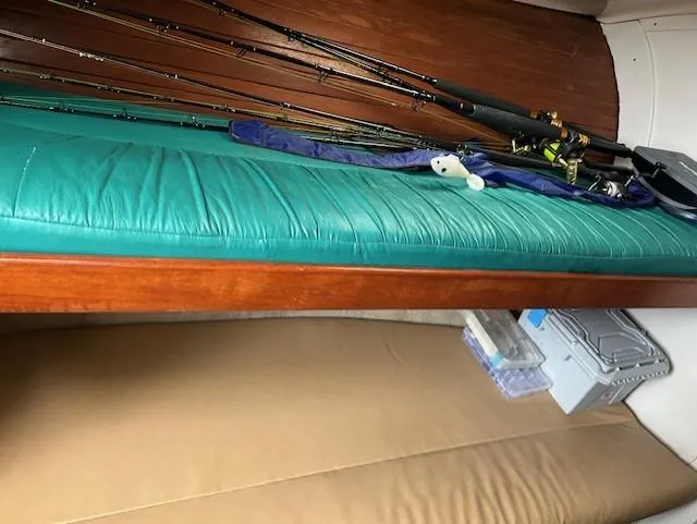 Slide: The Image of Interior of 1992 Luhrs Tournament 290 Open with fishing rods and storage boxes. - 5