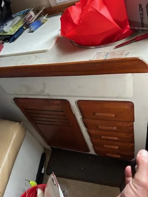 Slide: The Image of 1992 Luhrs Tournament 290 Open interior with wooden cabinets and countertop. - 6