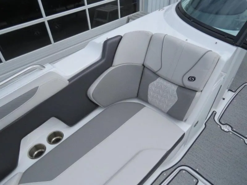 Slide: The Image of 2023 Hurricane SunDeck 2400 OB boat interior with gray and white seating. - 14