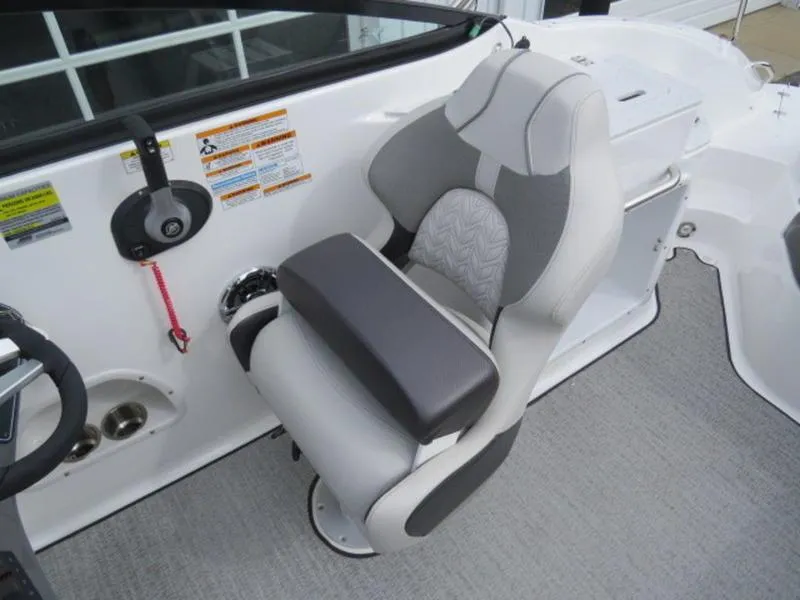 Slide: The Image of 2023 Hurricane SunDeck 2400 OB boat seat with gray and white upholstery. - 17