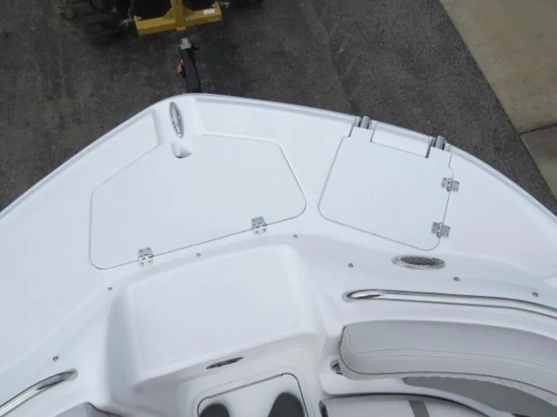 Slide: The Image of 2023 Hurricane SunDeck 2400 OB boat deck with storage compartments and seating. - 19