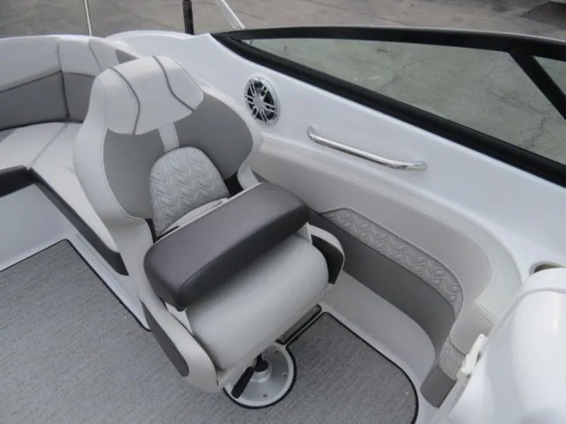 Slide: The Image of 2023 Hurricane SunDeck 2400 OB boat interior with gray seating and modern design. - 25