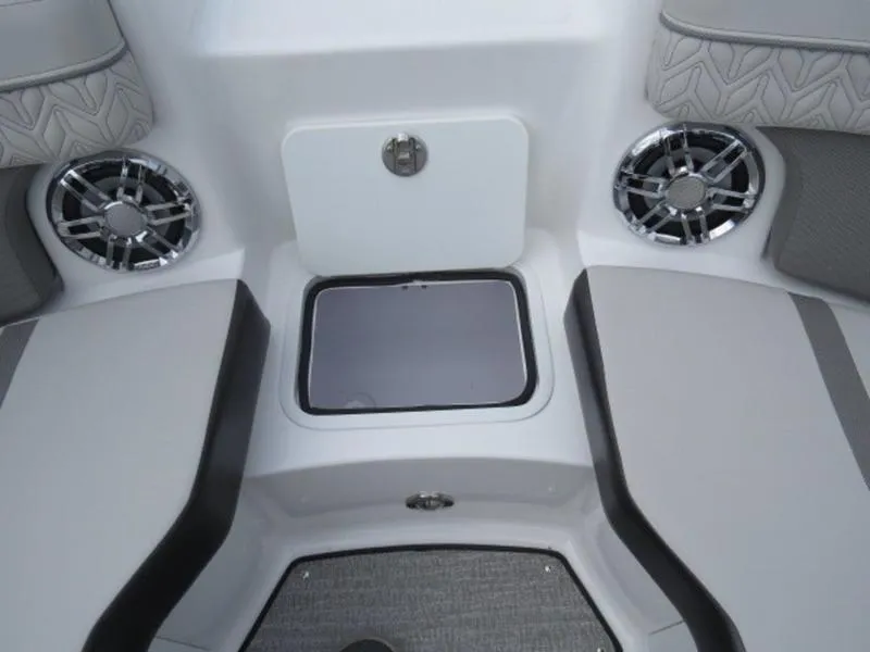 Slide: The Image of 2023 Hurricane SunDeck 2400 OB boat interior with seating and storage compartment. - 26