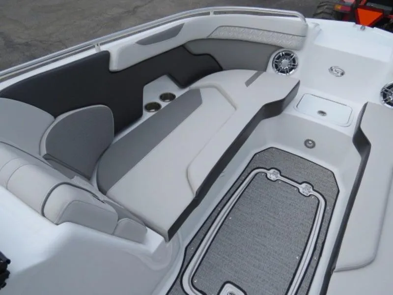 Slide: The Image of 2023 Hurricane SunDeck 2400 OB boat interior with cushioned seating and modern design. - 8