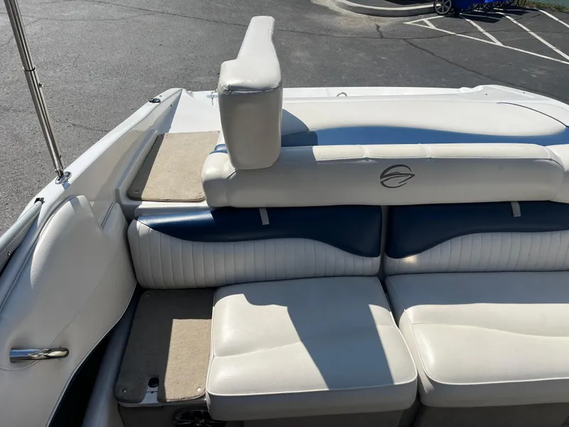 Slide: The Image of 2008 Crownline 23SS boat interior with white and blue seating. - 21