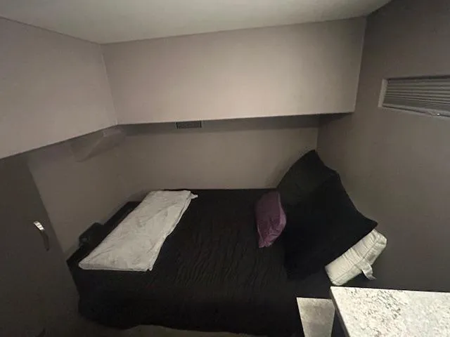 Slide: The Image of Cozy bedroom interior on 2020 Adonia houseboat with modern decor and comfortable bedding. - 14