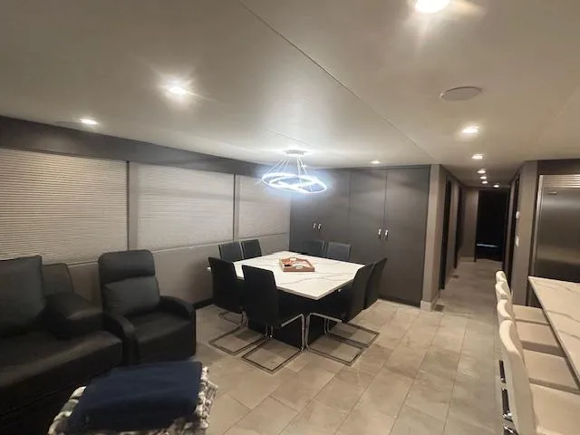 Slide: The Image of Modern interior of 2020 Adonia houseboat with dining area and stylish lighting. - 18
