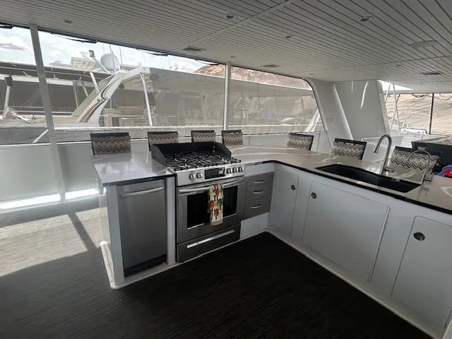 Slide: The Image of Modern kitchen interior of 2020 Adonia houseboat with stove and sink. - 31