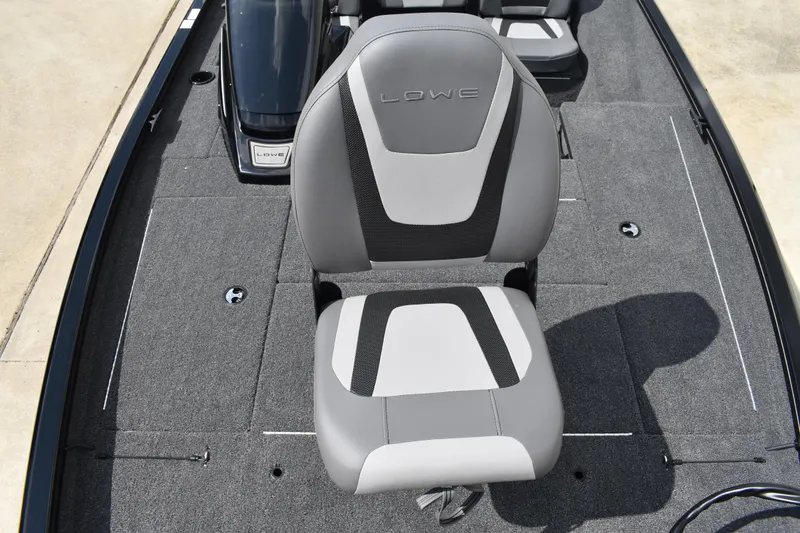 Slide: The Image of 2025 Lowe Stinger 175C boat with Mercury outboard motor on a trailer. - 10