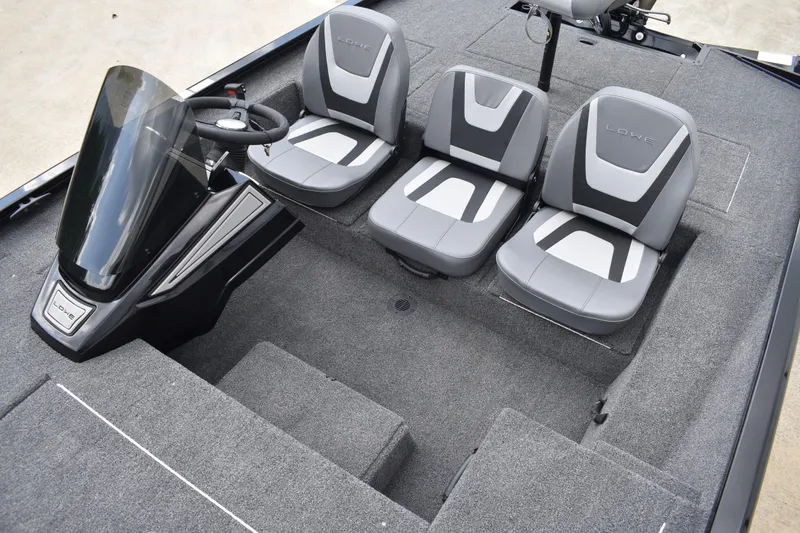 Slide: The Image of 2025 Lowe Stinger 175C boat seat with storage compartment, gray upholstery, and black lid. - 25