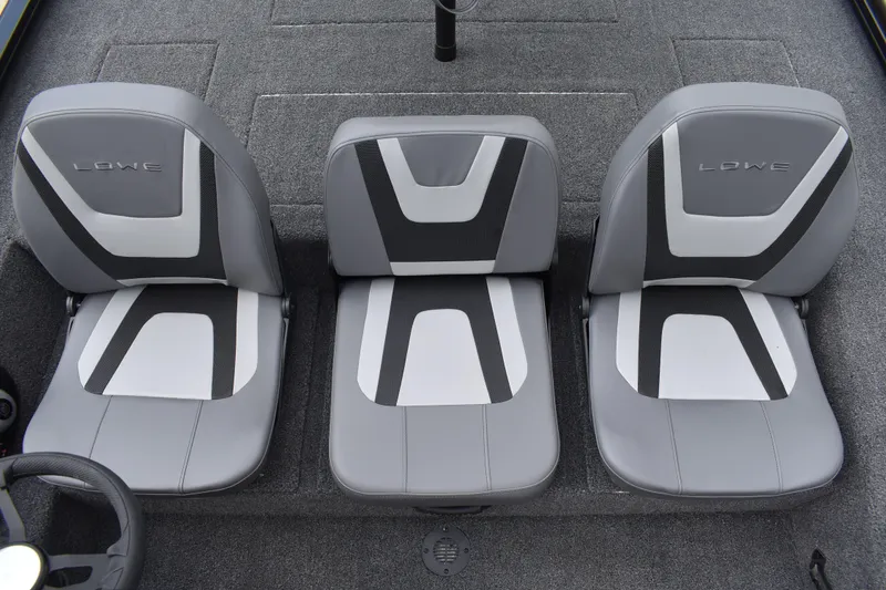 Slide: The Image of 2025 Lowe Stinger 175C boat seats, gray and black design, top view. - 26
