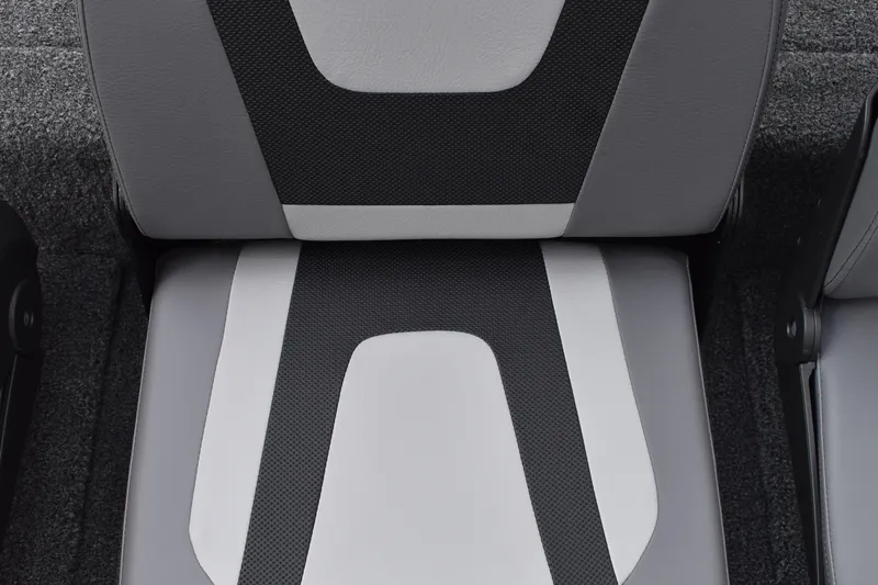 Slide: The Image of 2025 Lowe Stinger 175C boat interior with gray seating and storage compartments. - 27