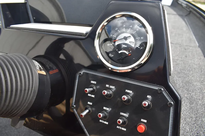 Slide: The Image of 2025 Lowe Stinger 175C dashboard with sleek design and modern instrumentation. - 39