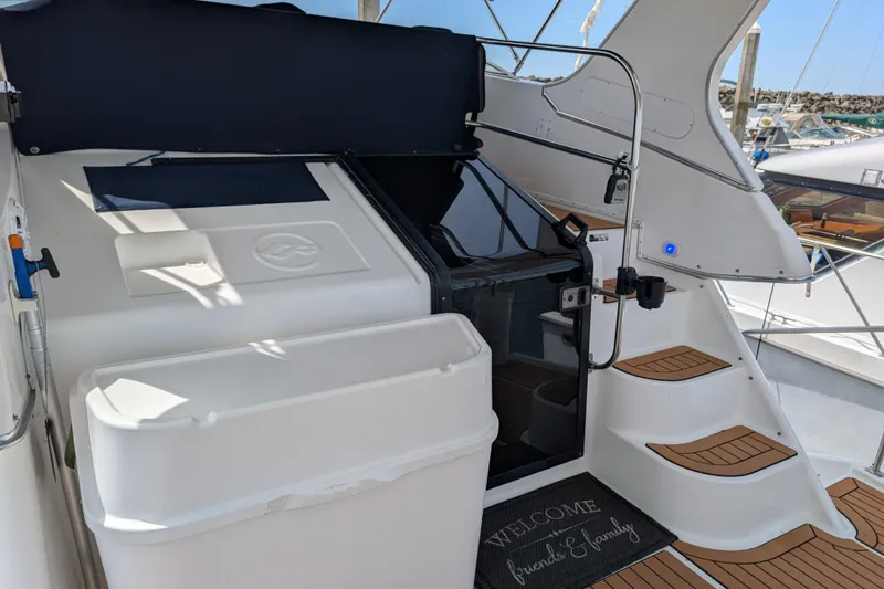Slide: The Image of Bayliner 4088 yacht interior with stairs and seating, 2000 model. - 9