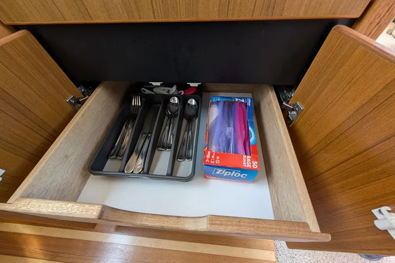 Slide: The Image of Open drawer with cutlery tray and Ziploc bags on Bayliner 4088 yacht, 2000 model. - 27
