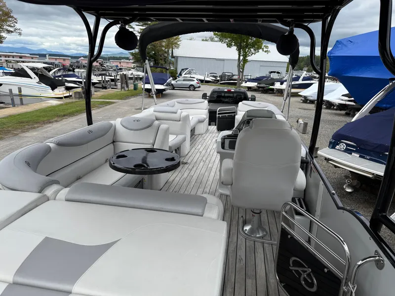 Slide: The Image of 2015 Avalon Paradise Funship 27' pontoon boat with spacious seating and sleek design. - 10