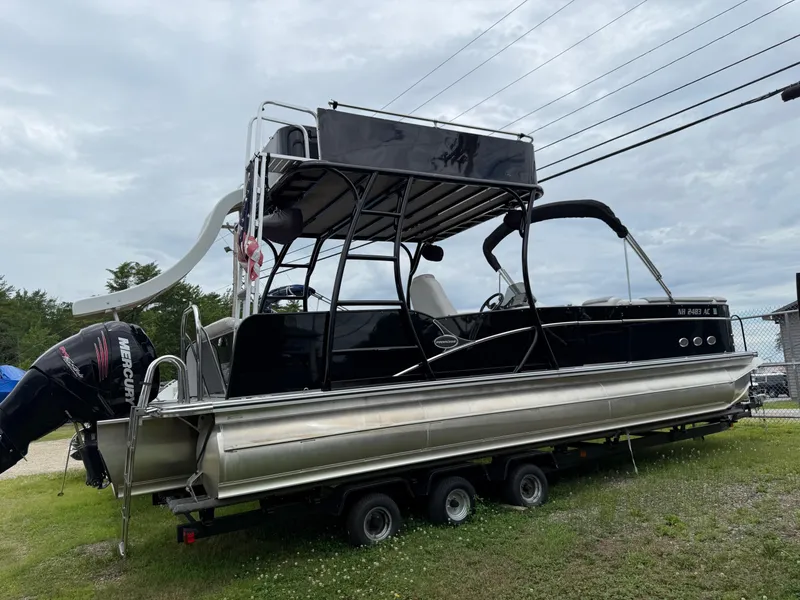 Slide: The Image of 2015 Avalon Paradise Funship 27' pontoon boat with slide and Mercury outboard motor. - 17