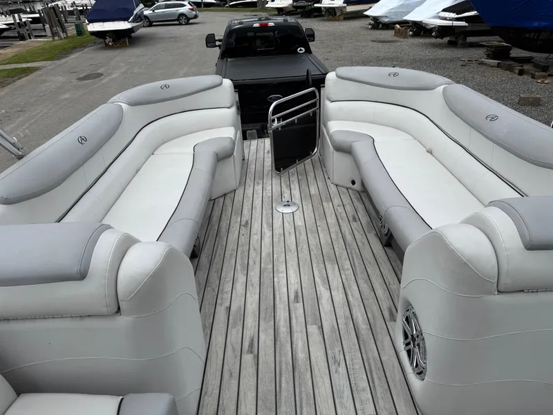 Slide: The Image of 2015 Avalon Paradise Funship 27' pontoon boat with spacious seating and sleek design. - 5