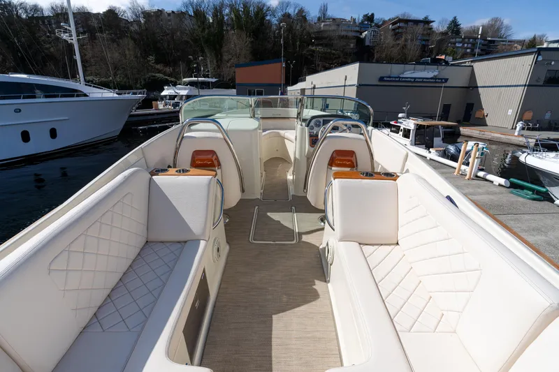 Slide: The Image of 2022 Chris-Craft Launch 27 boat interior with luxurious seating and elegant design. - 4