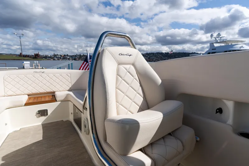 Slide: The Image of 2022 Chris-Craft Launch 27 boat interior with luxurious seating and elegant design. - 6